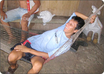 Sacha Inchi farmer relaxing in a hammock